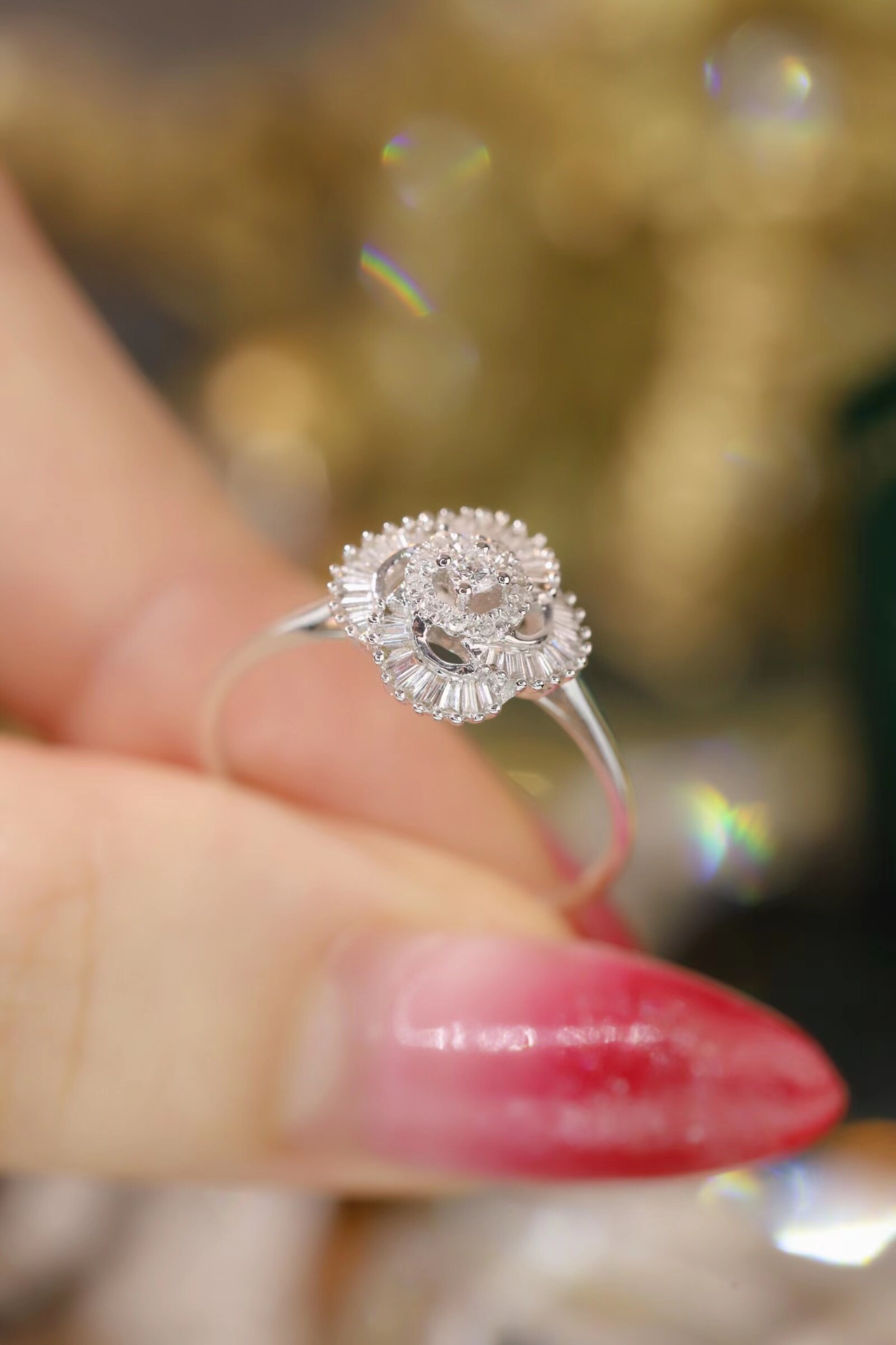 18k gold ring set with a natural diamond; the diamond features a Tapered Baguette cut and weighs 0.25carats.
