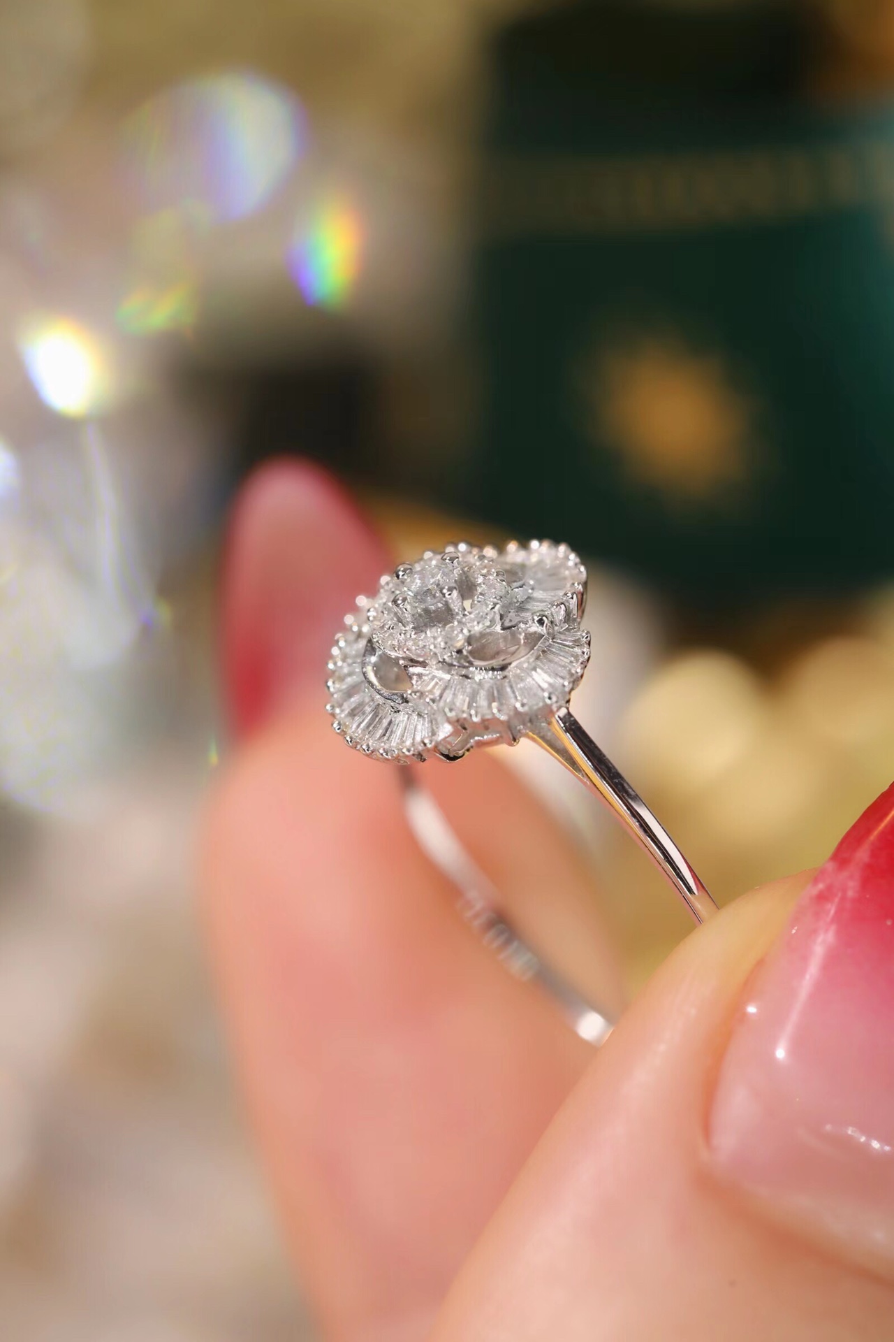 18k gold ring set with a natural diamond; the diamond features a Tapered Baguette cut and weighs 0.25carats.