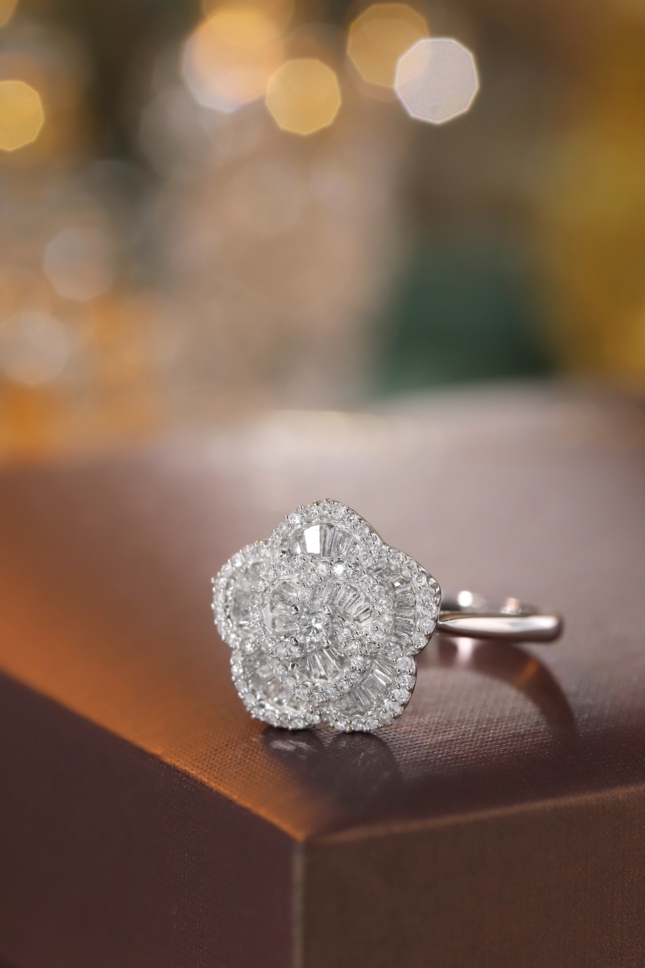 18k gold ring set with a natural diamond; the diamond features a Tapered Baguette cut and weighs 0.50carats.