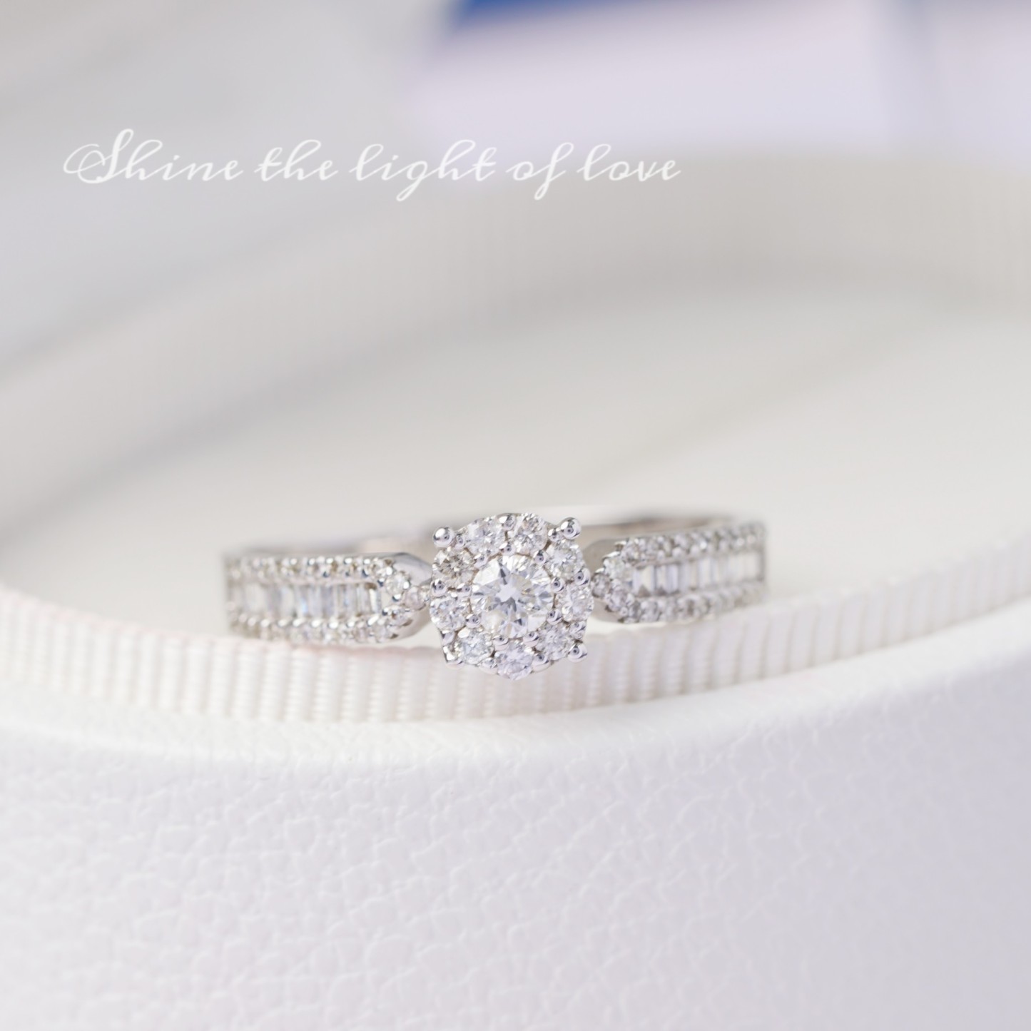 18k gold ring set with a natural diamond; the diamond features a Tapered Baguette cut and weighs 0.47carats.