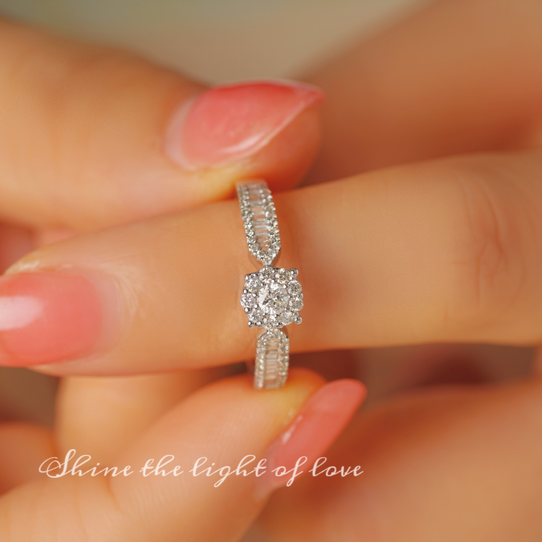 18k gold ring set with a natural diamond; the diamond features a Tapered Baguette cut and weighs 0.47carats.