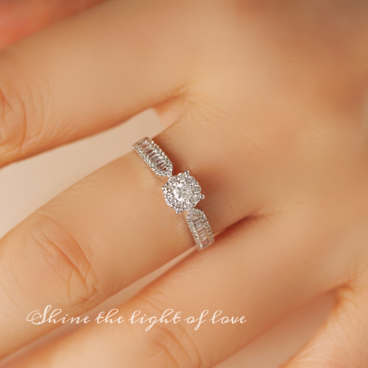 18k gold ring set with a natural diamond; the diamond features a Tapered Baguette cut and weighs 0.47carats.