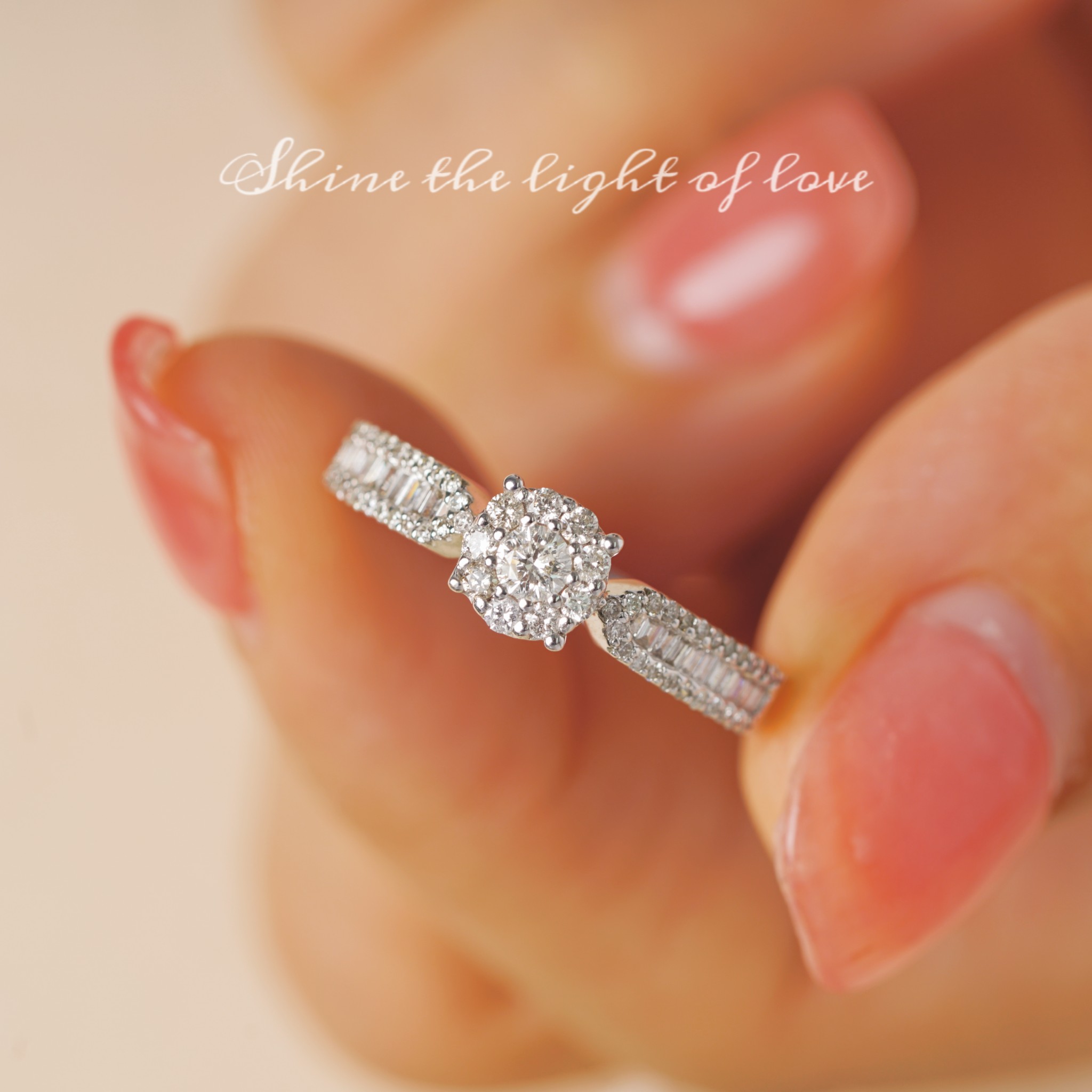 18k gold ring set with a natural diamond; the diamond features a Tapered Baguette cut and weighs 0.47carats.