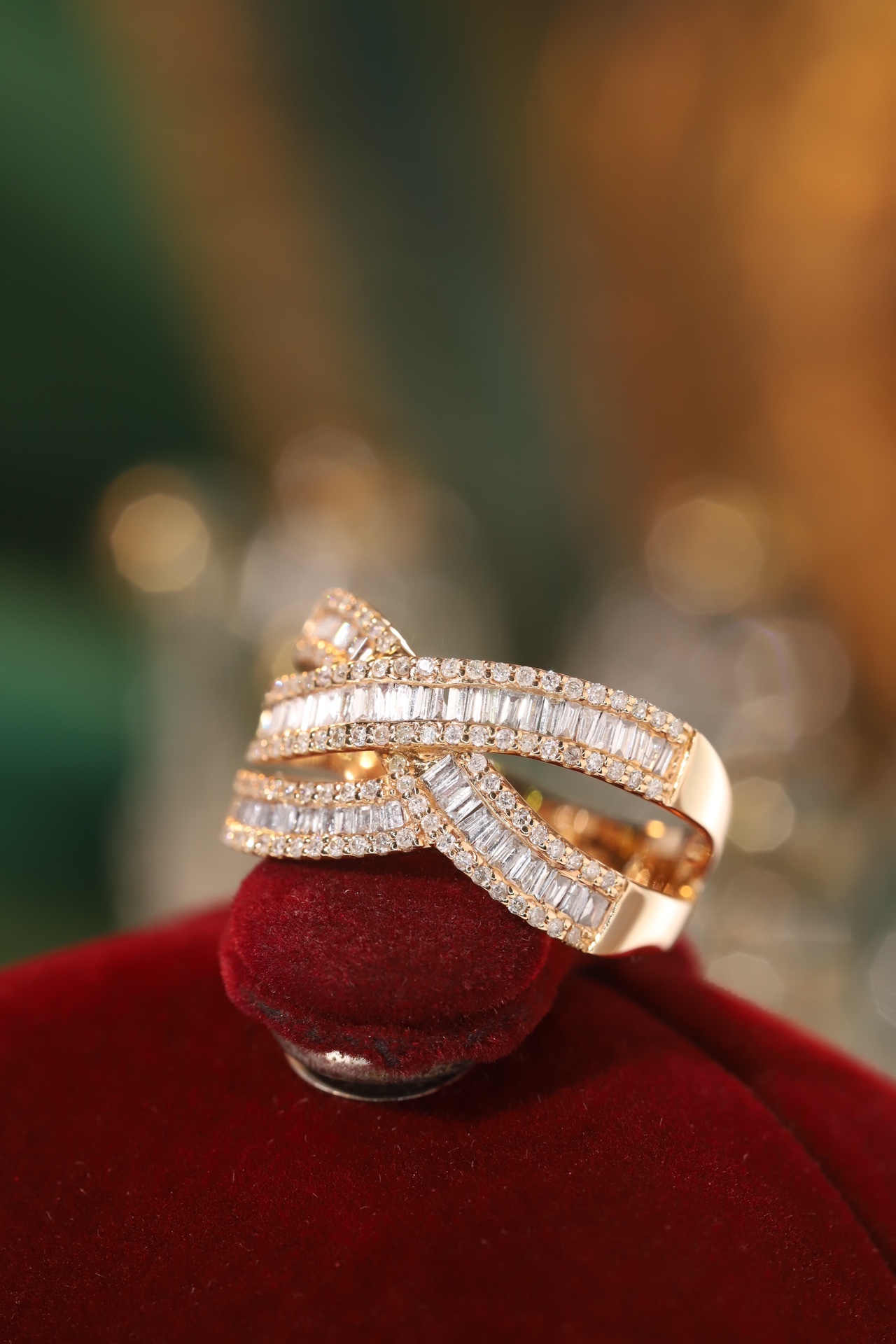 18k gold ring set with a natural diamond; the diamond features a Tapered Baguette cut and weighs 0.75carats.