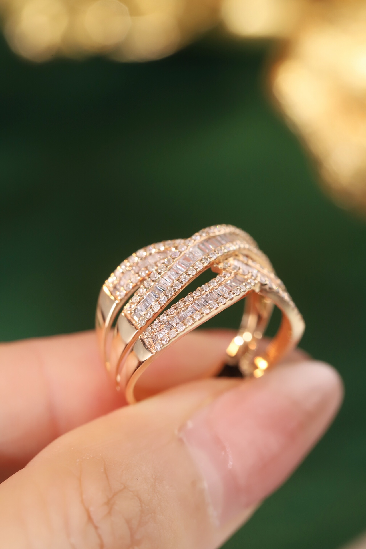 18k gold ring set with a natural diamond; the diamond features a Tapered Baguette cut and weighs 0.75carats.