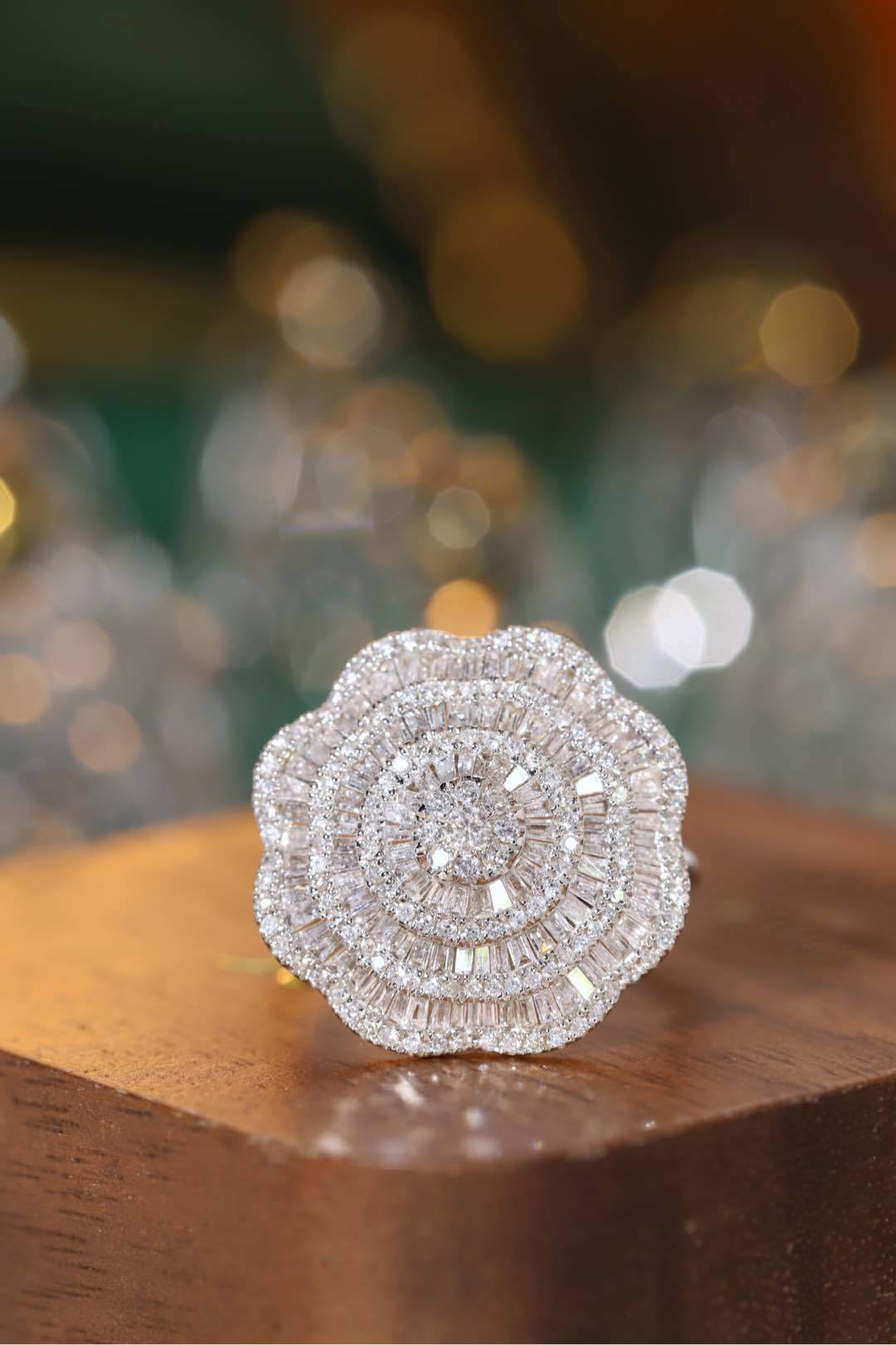 18k gold ring set with a natural diamond; the diamond features a Tapered Baguette cut and weighs 1.50carats.