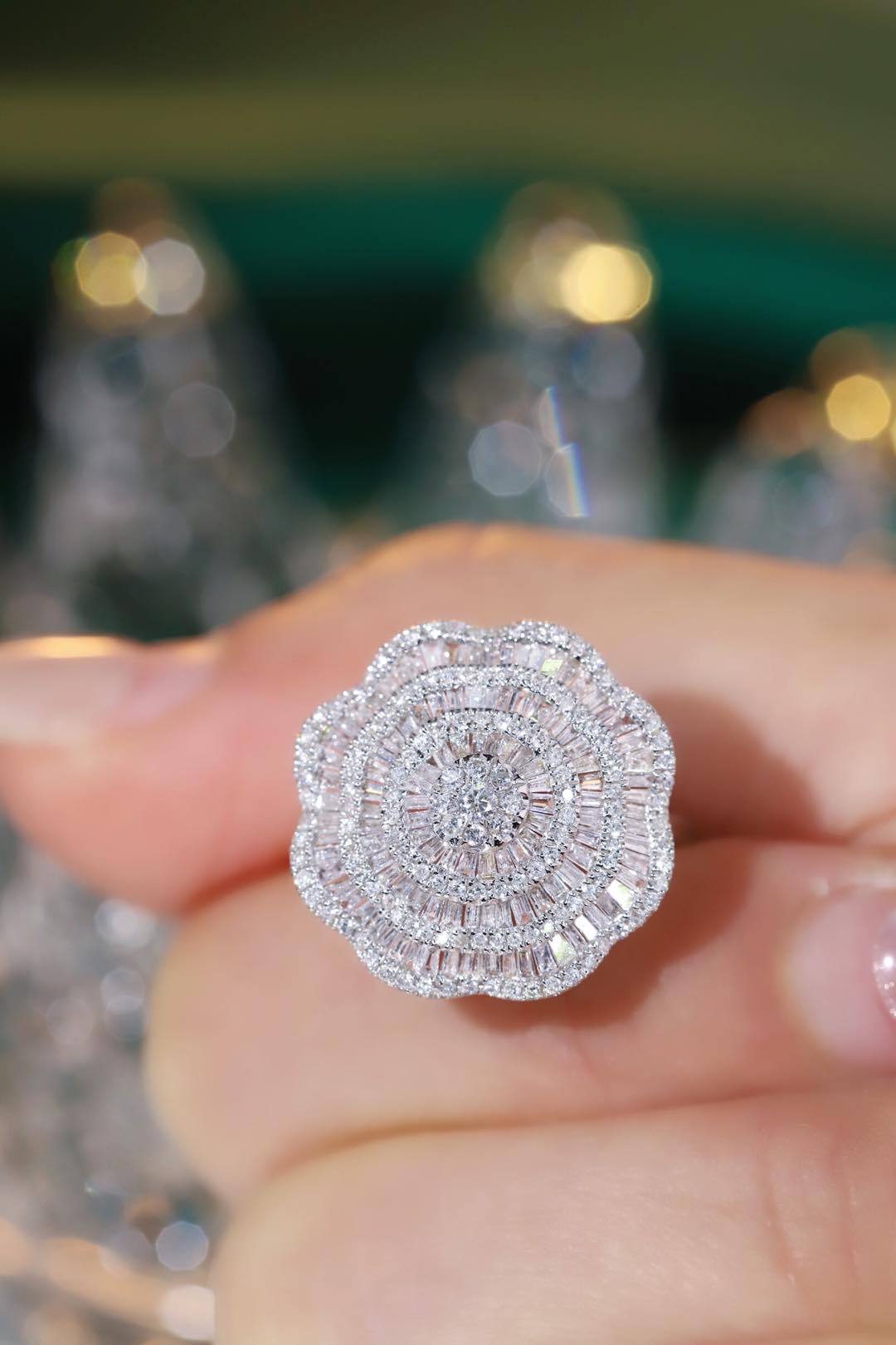 18k gold ring set with a natural diamond; the diamond features a Tapered Baguette cut and weighs 1.50carats.