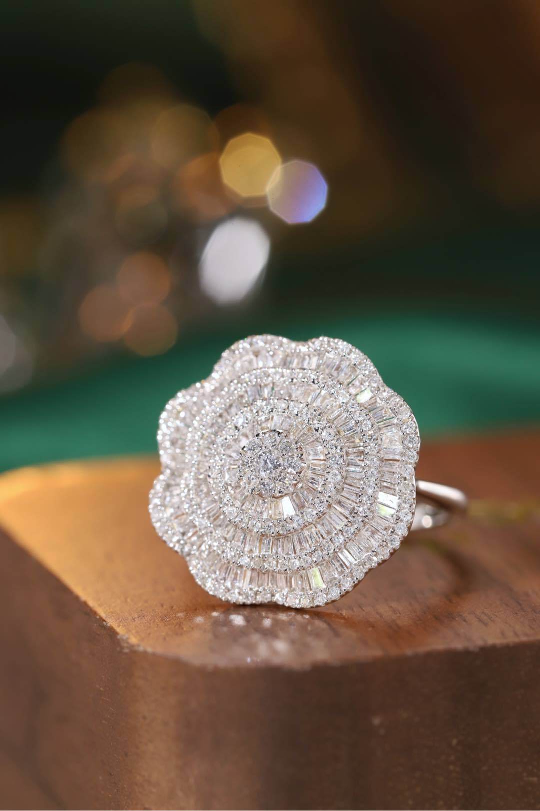 18k gold ring set with a natural diamond; the diamond features a Tapered Baguette cut and weighs 1.50carats.