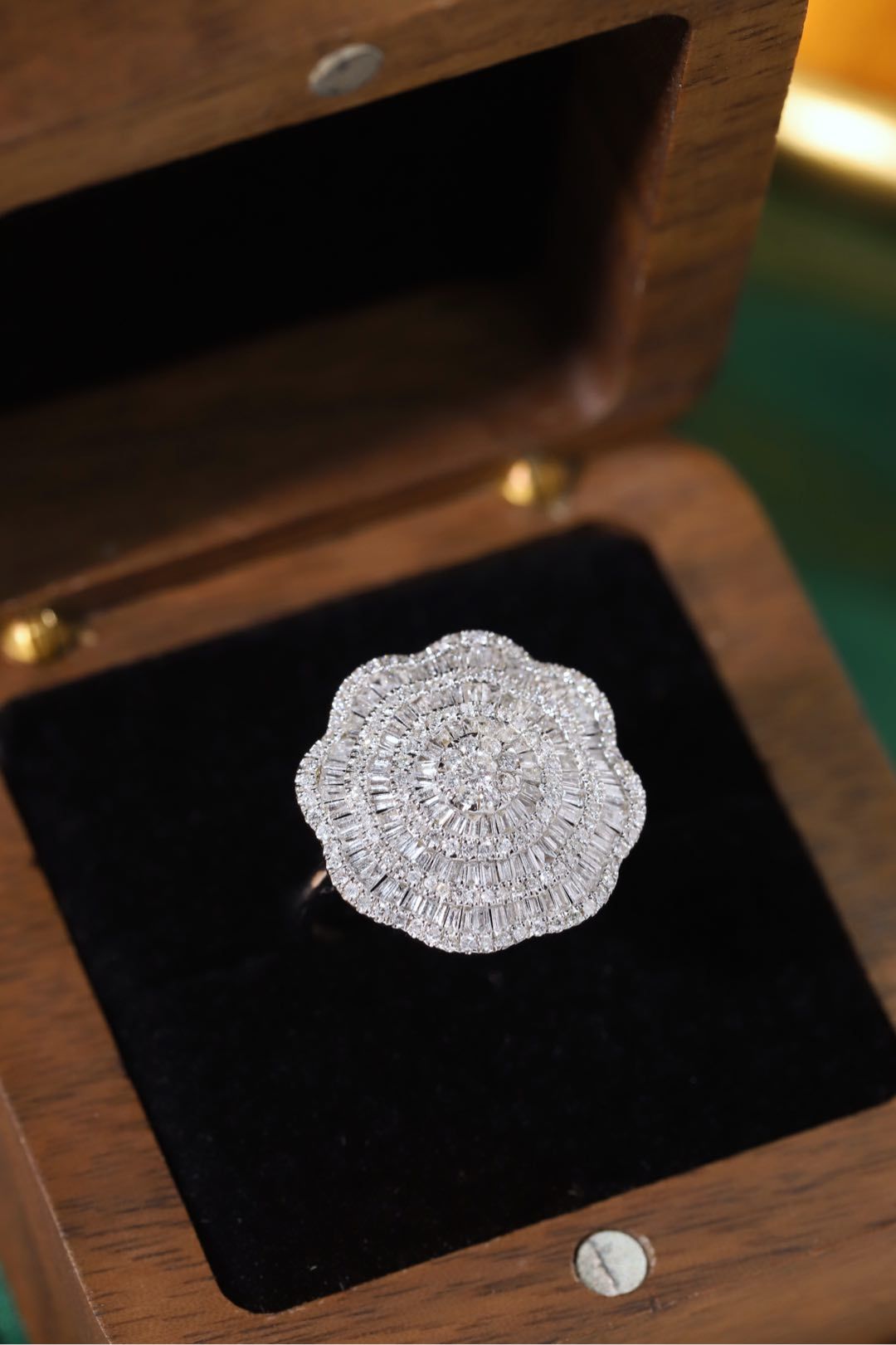 18k gold ring set with a natural diamond; the diamond features a Tapered Baguette cut and weighs 1.50carats.