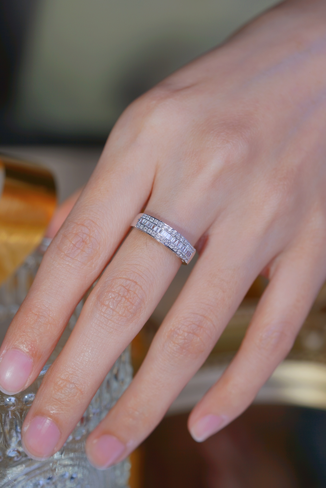 18k gold ring set with a natural diamond; the diamond features a Tapered Baguette cut and weighs 0.50 carats.