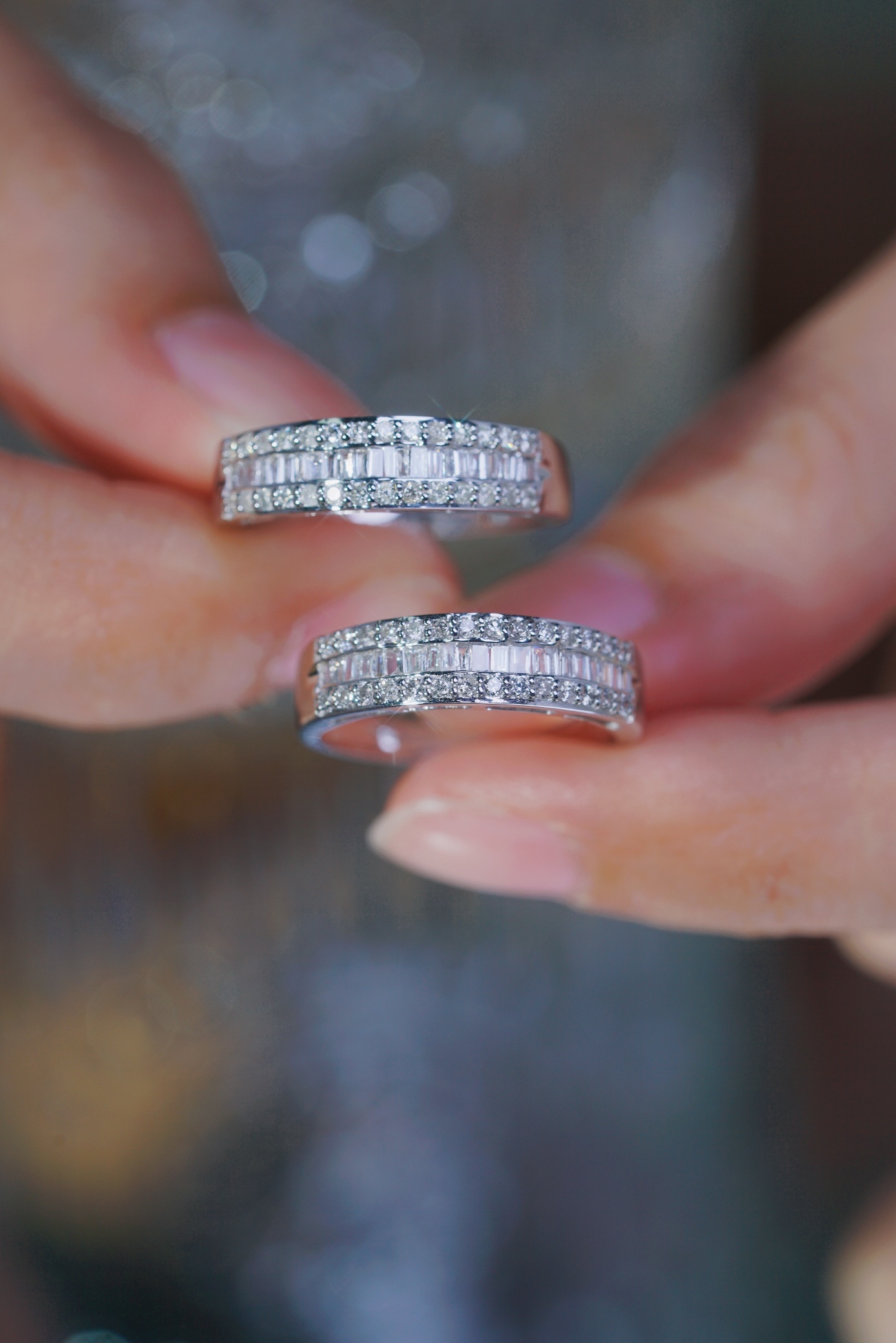 18k gold ring set with a natural diamond; the diamond features a Tapered Baguette cut and weighs 0.50 carats.