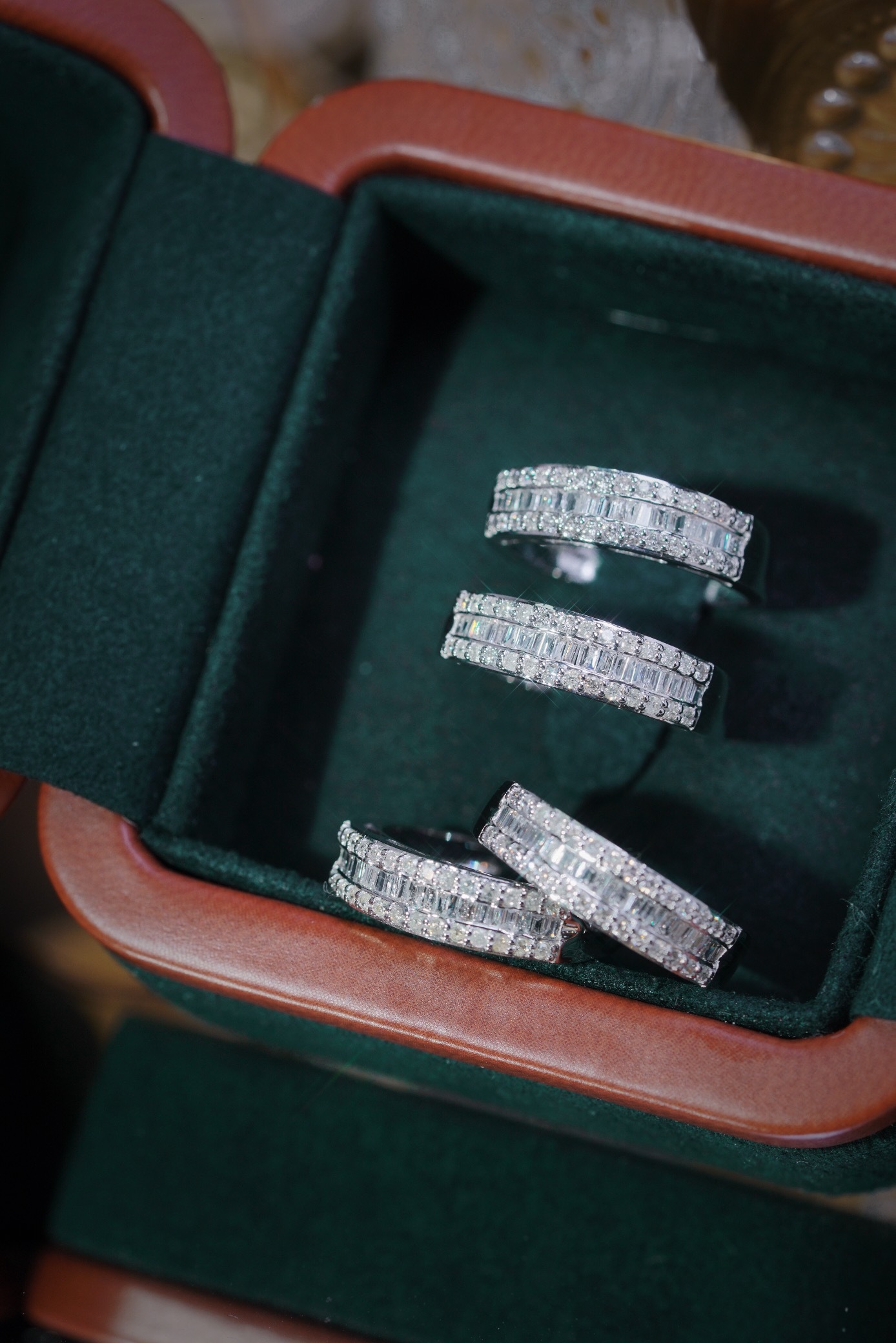 18k gold ring set with a natural diamond; the diamond features a Tapered Baguette cut and weighs 0.50 carats.