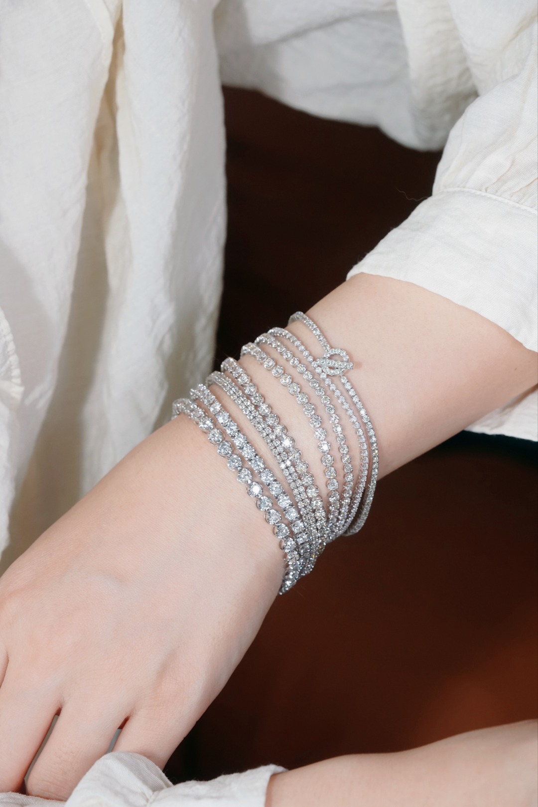 18k gold bracelet with natural diamonds; available in sizes of 1ct and 2ct; designed as a tennis bracelet.