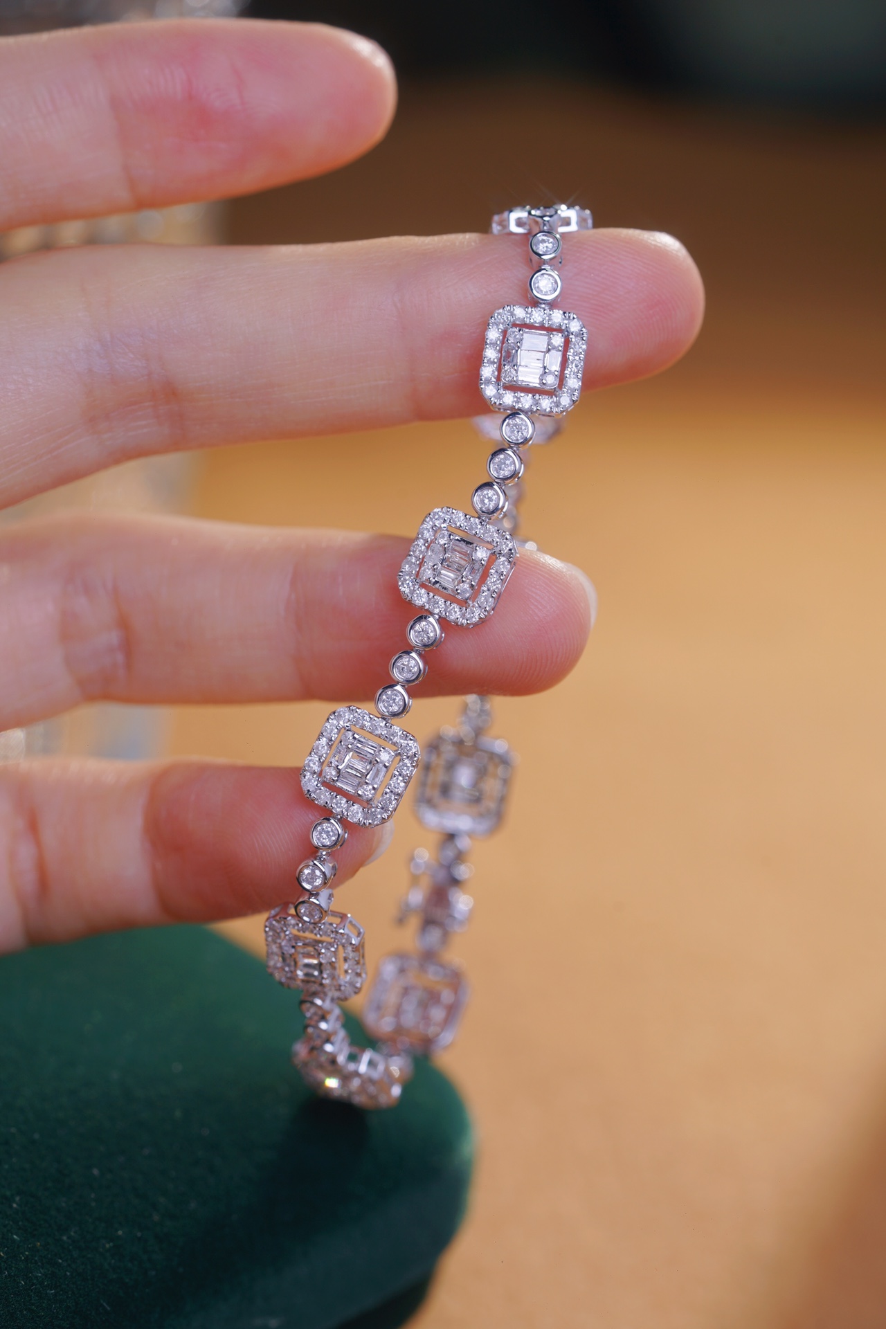 18-karat gold bracelet featuring a natural diamond of 2.45 carats, set in a Tapered Baguette style.