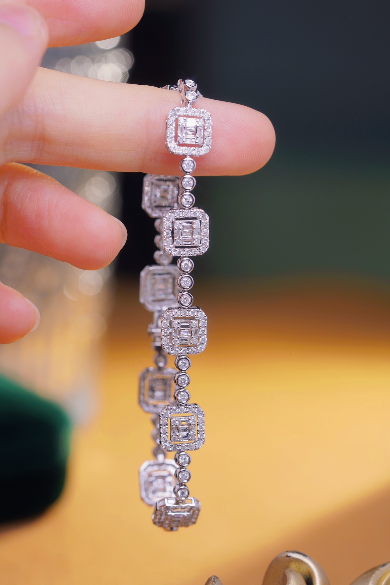18-karat gold bracelet featuring a natural diamond of 2.45 carats, set in a Tapered Baguette style.