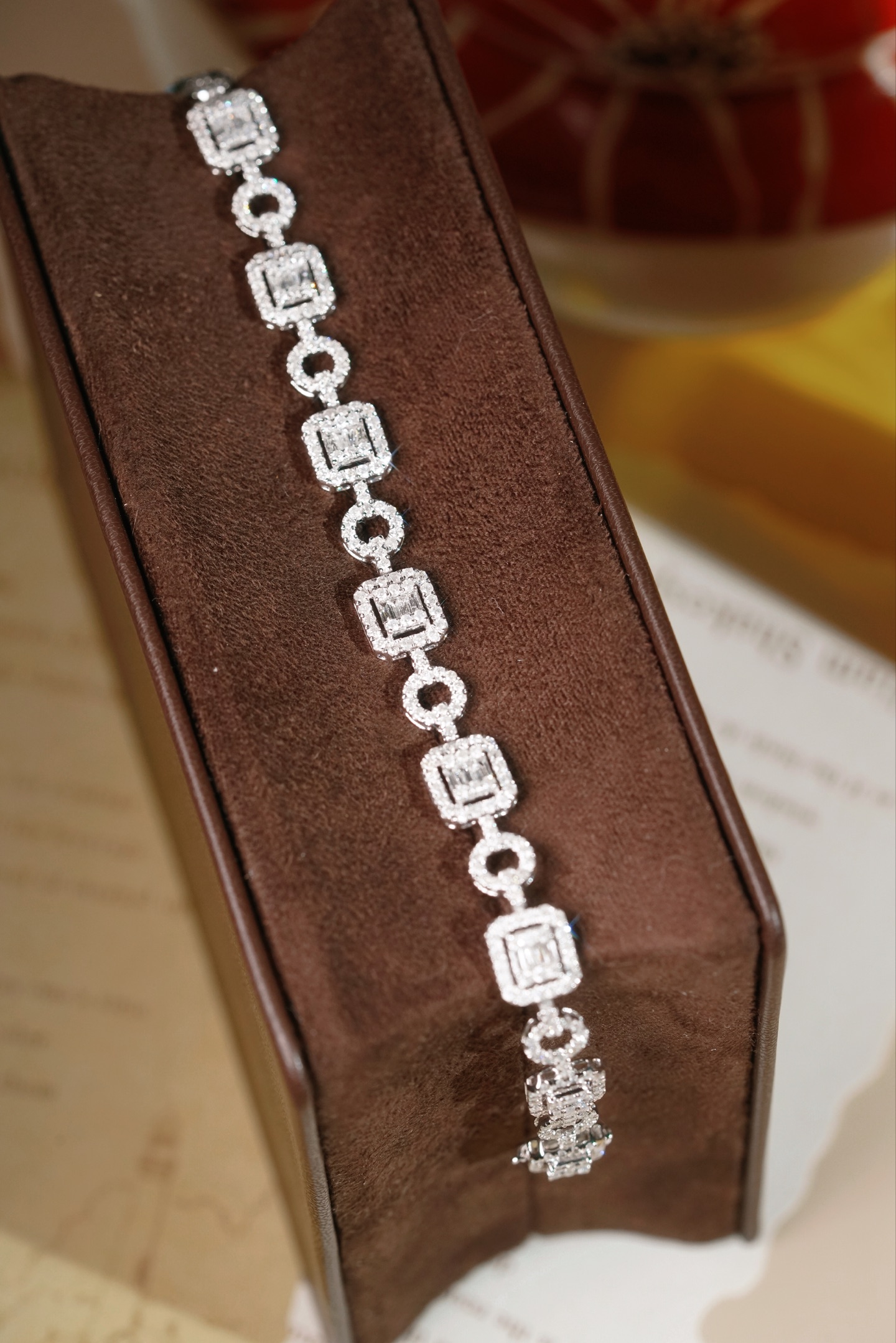 18-karat gold bracelet featuring a natural diamond of 3.50 carats, set in a Tapered Baguette style.