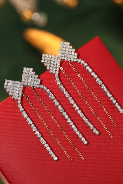 18k gold earrings set with a 1.20ct natural diamond