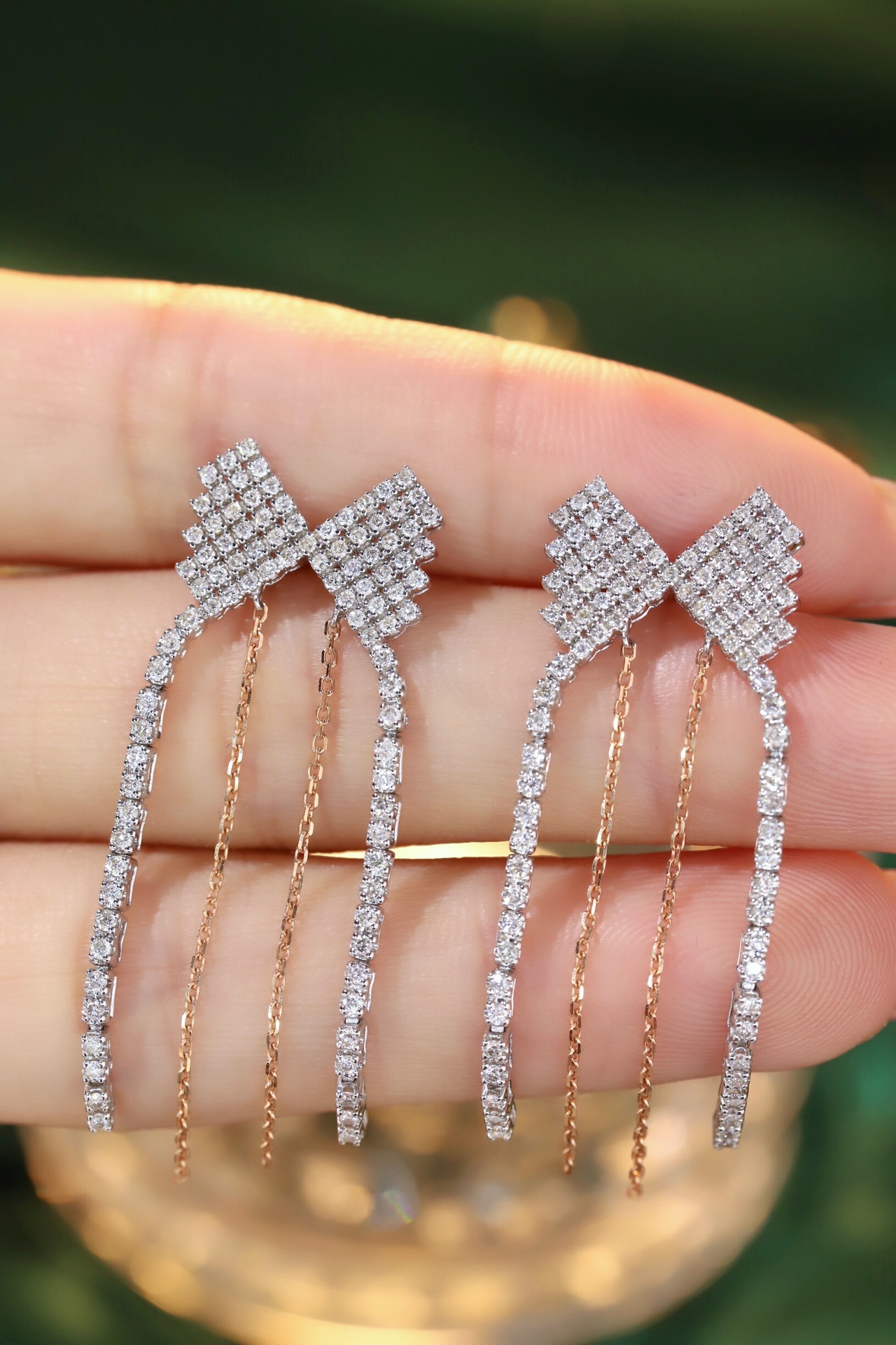 18k gold earrings set with a 1.20ct natural diamond