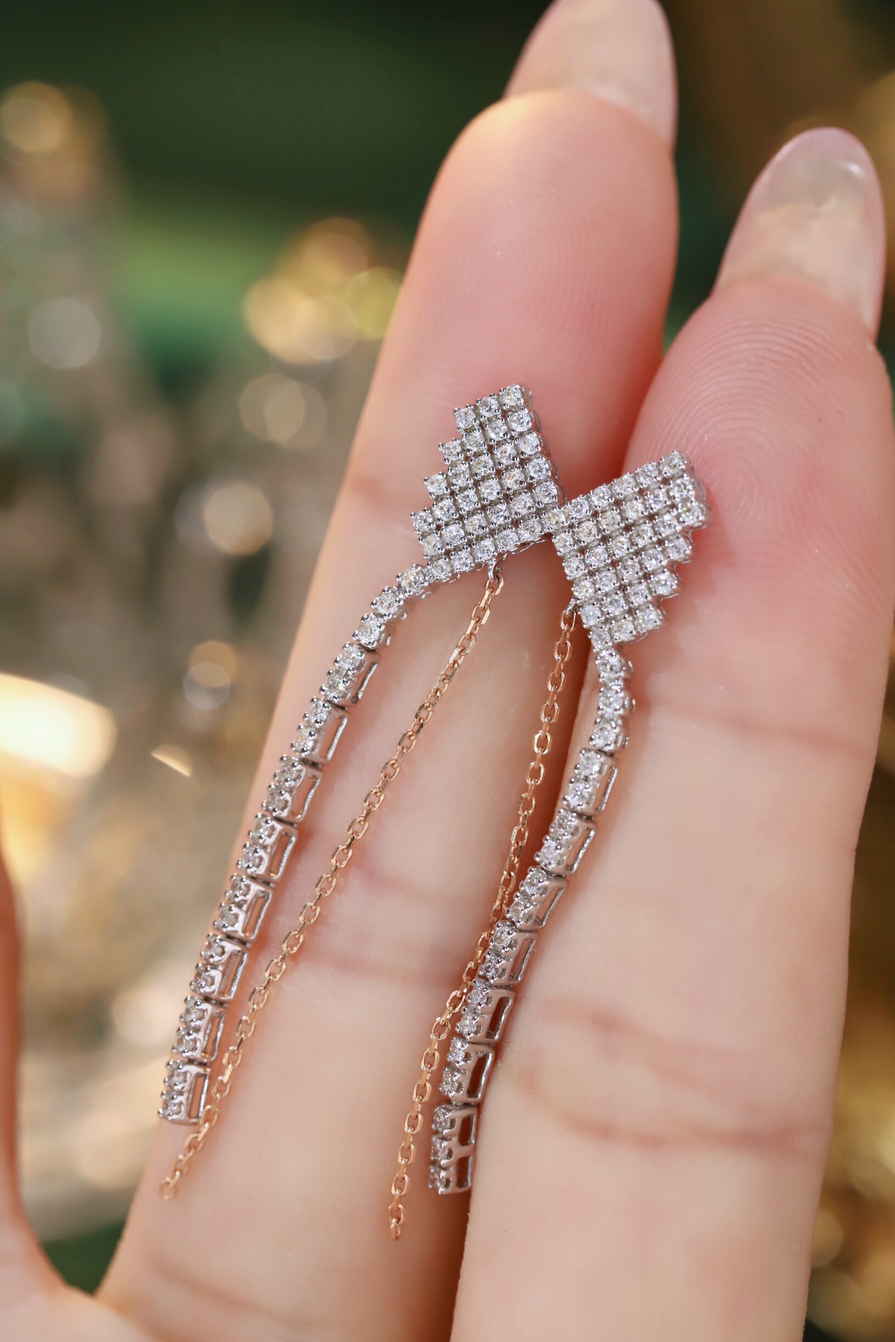 18k gold earrings set with a 1.20ct natural diamond