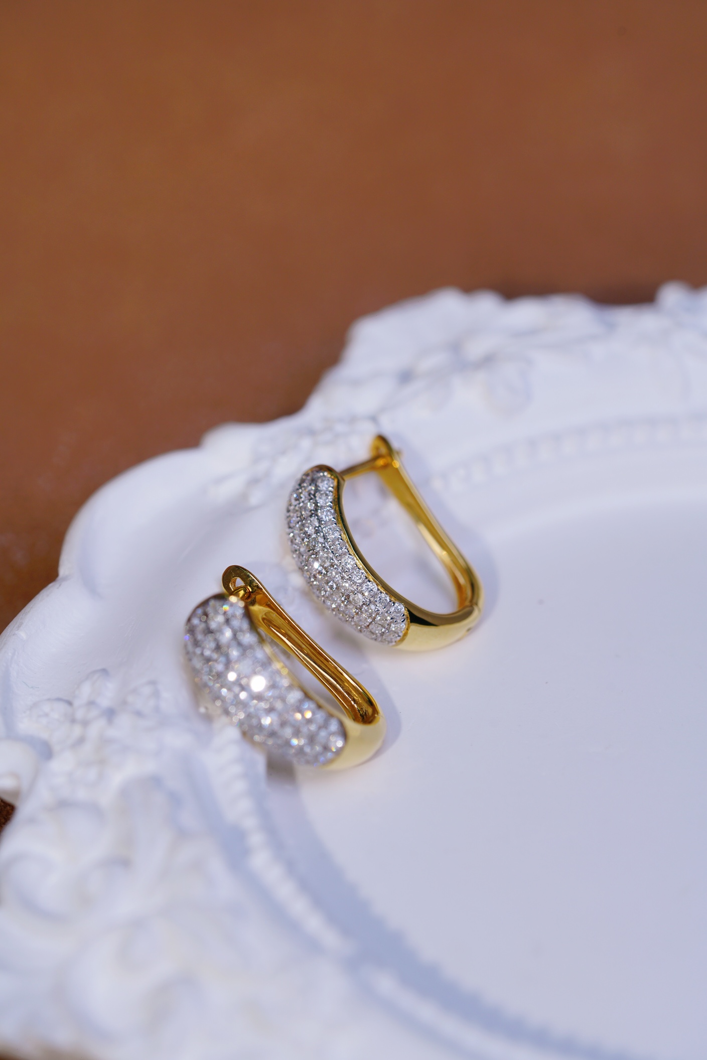 18k gold earrings set with 0.70ct natural diamond