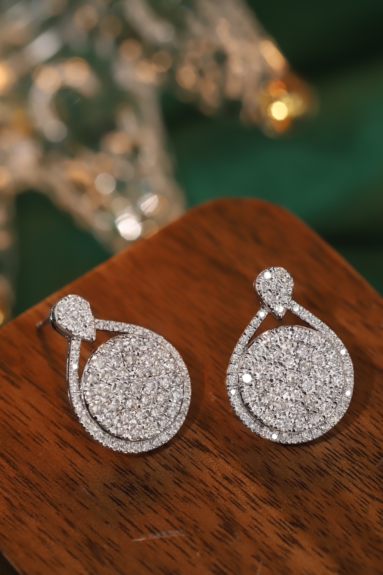 18k gold earrings set with a 2.00-carat natural diamond