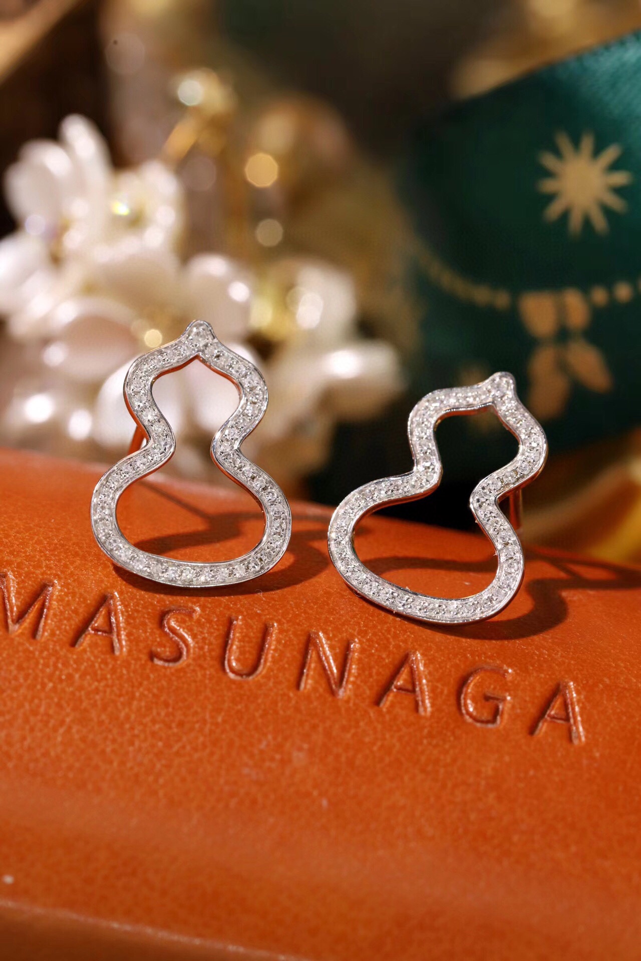 18k Gold Earrings in Gourd Shape, Studded with 0.28ct Natural Diamond