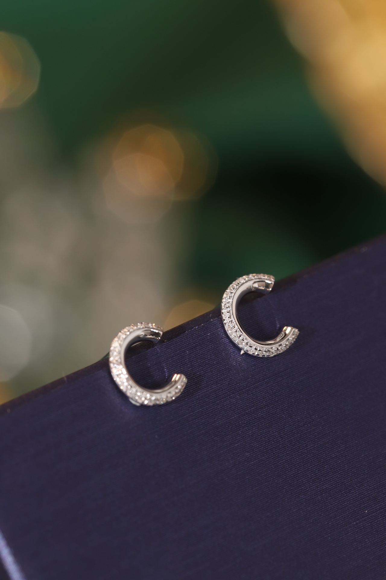 18k gold earring stud with the letter “C” and a 0.08ct natural diamond inlaid.