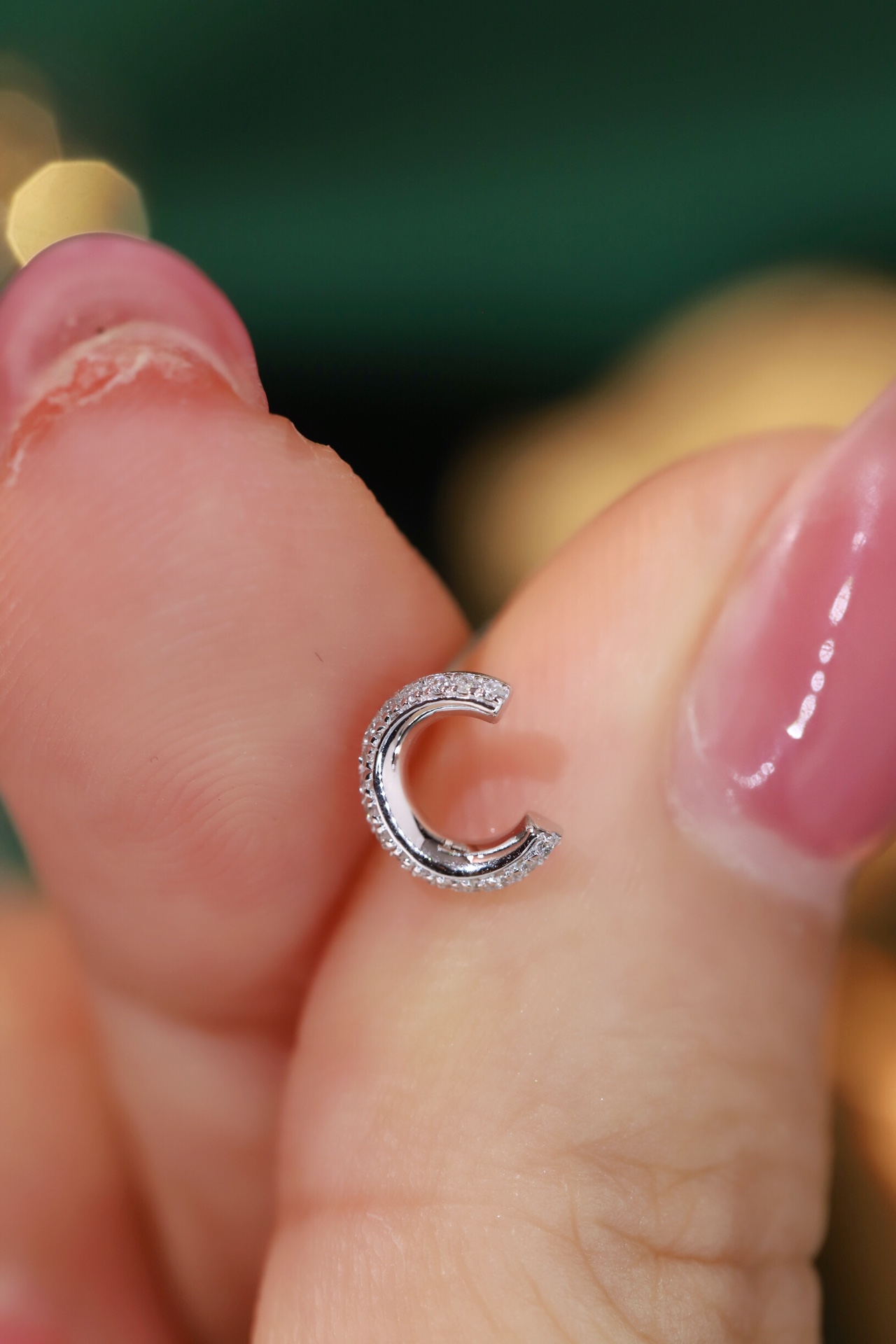 18k gold earring stud with the letter “C” and a 0.08ct natural diamond inlaid.