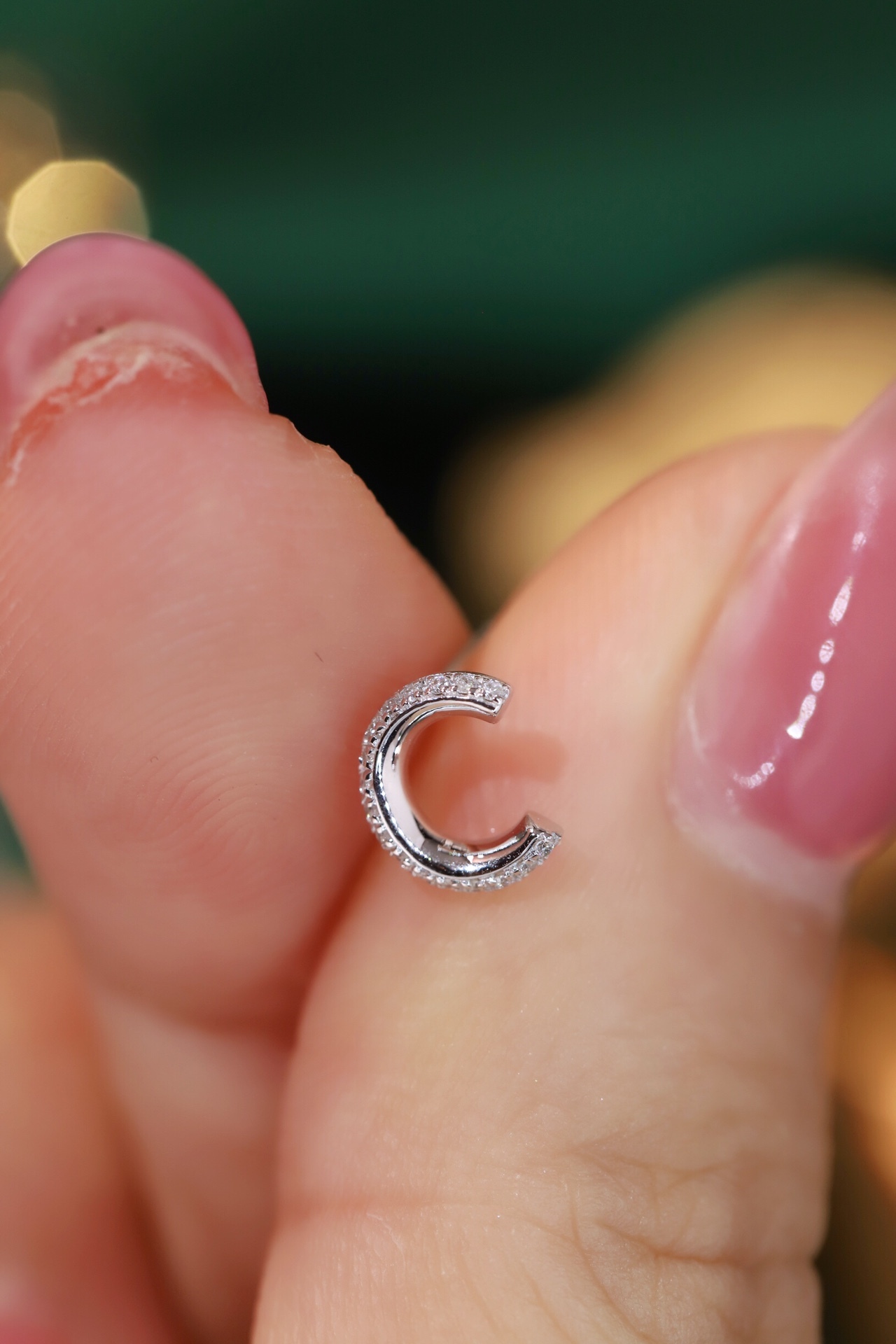 18k gold earring stud with the letter “C” and a 0.08ct natural diamond inlaid.