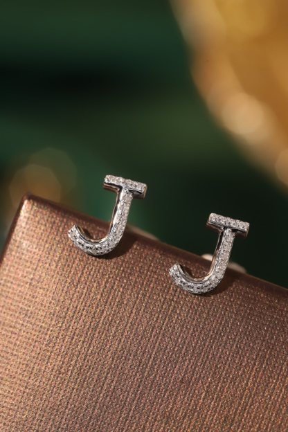 18k gold earring stud with the letter “J” and a 0.08ct natural diamond inlaid.