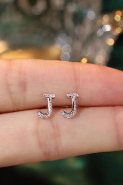 18k gold earring stud with the letter “J” and a 0.08ct natural diamond inlaid.