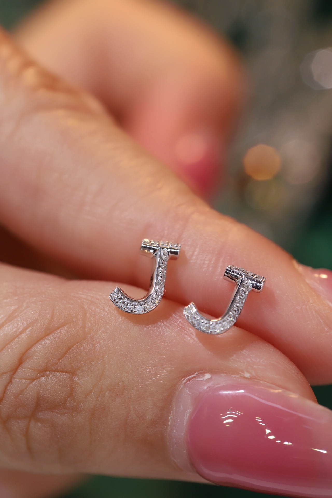 18k gold earring stud with the letter “J” and a 0.08ct natural diamond inlaid.