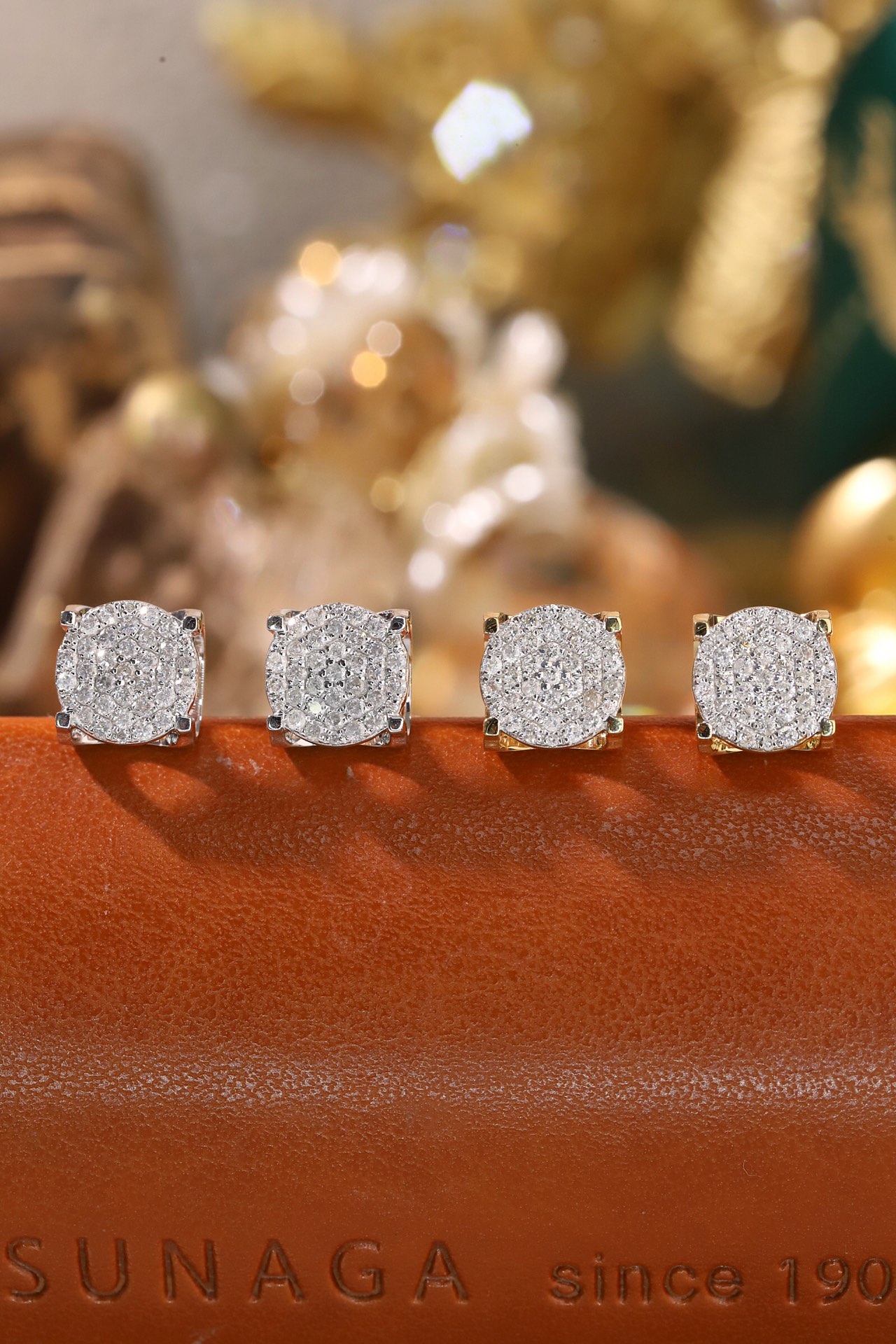 18k Gold Earring Studs with Bull Head Design; Diamond Insert of 0.50 ct Set in a Hidden Mount