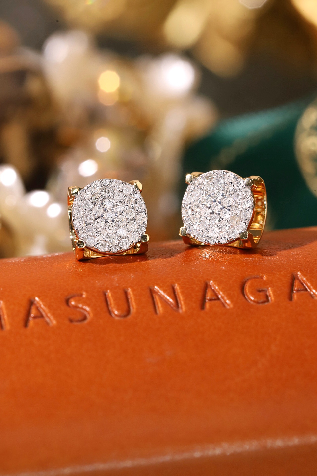 18k Gold Earring Studs with Bull Head Design; Diamond Insert of 0.50 ct Set in a Hidden Mount