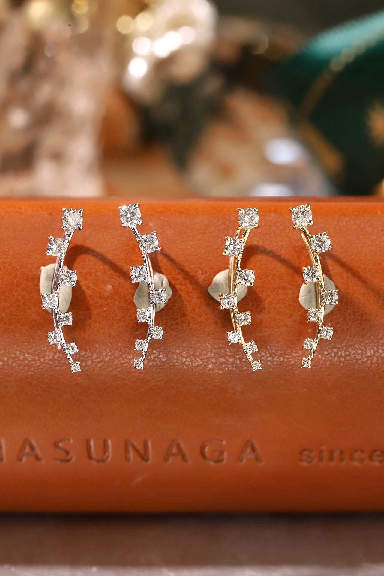 18k gold earrings set with a 0.48ct natural diamond