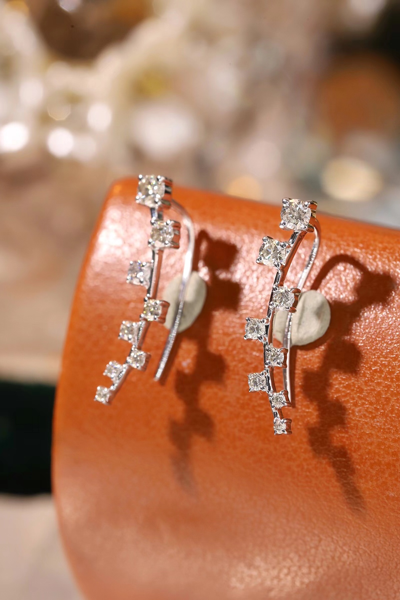 18k gold earrings set with a 0.48ct natural diamond