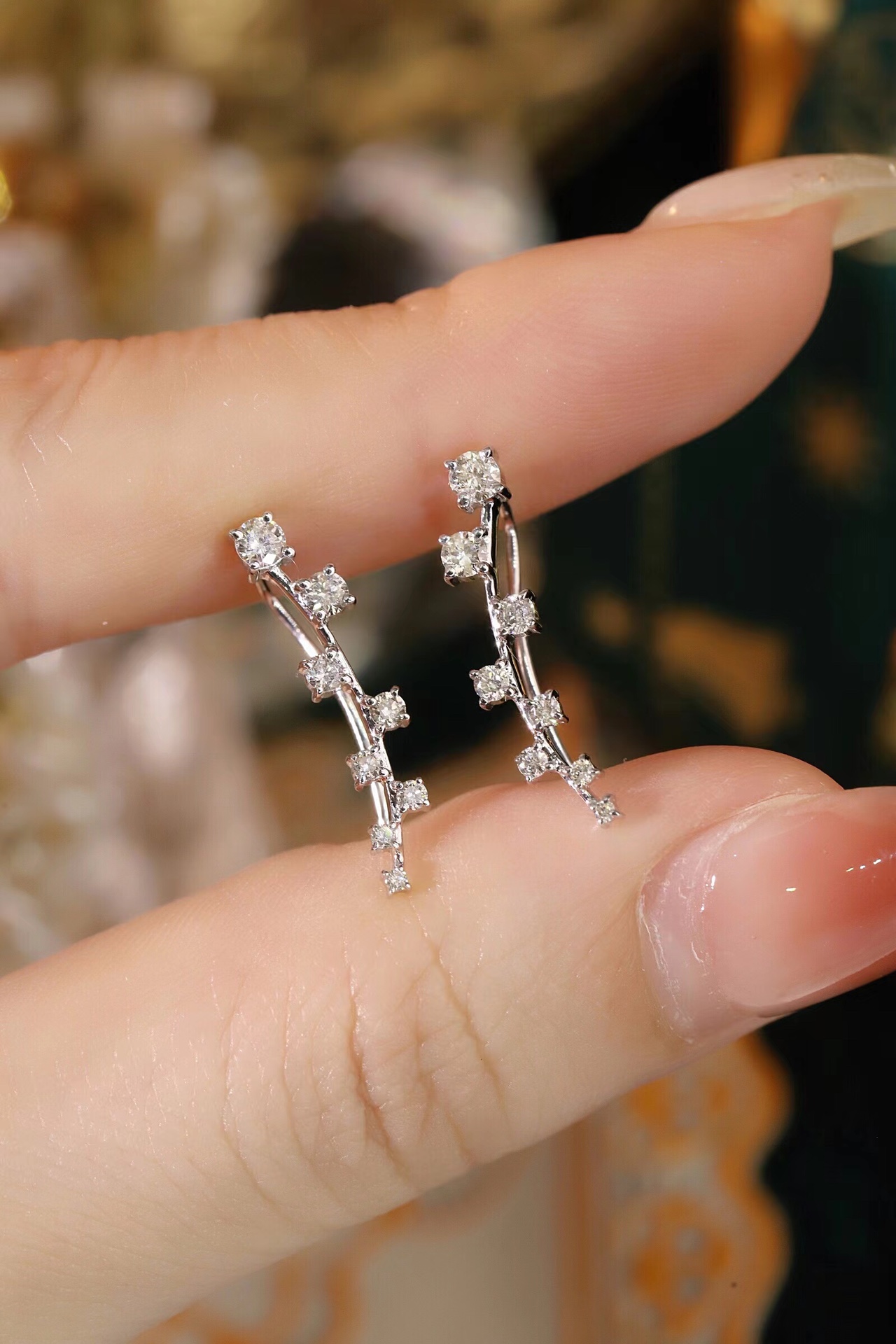 18k gold earrings set with a 0.48ct natural diamond