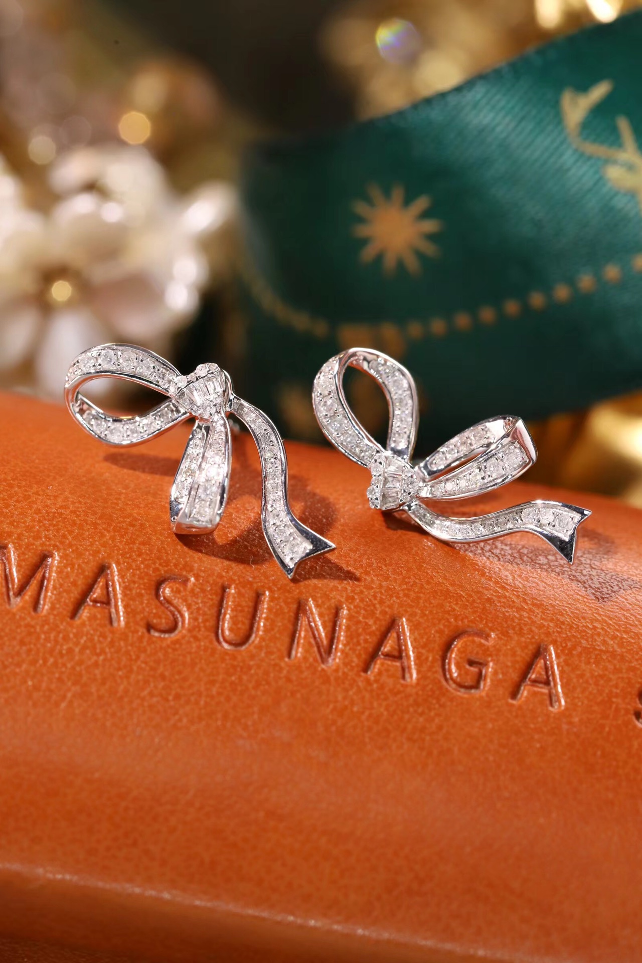 Butterfly  ear studs with two wearing options, inlaid with 0.50ct natural diamonds