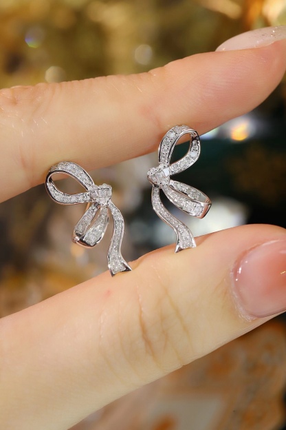 Butterfly  ear studs with two wearing options, inlaid with 0.50ct natural diamonds
