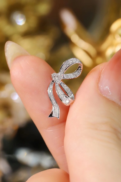 Butterfly  ear studs with two wearing options, inlaid with 0.50ct natural diamonds