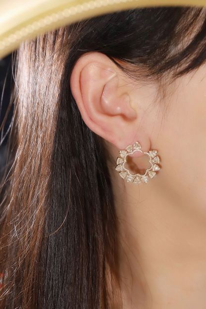 18k gold earrings set with 1.20ct natural diamond