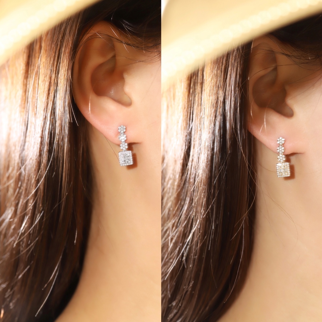 18k gold earrings set with 0.50ct natural diamond