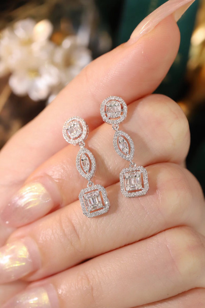 18k Gold Earrings Set with a 0.70ct Natural Diamond