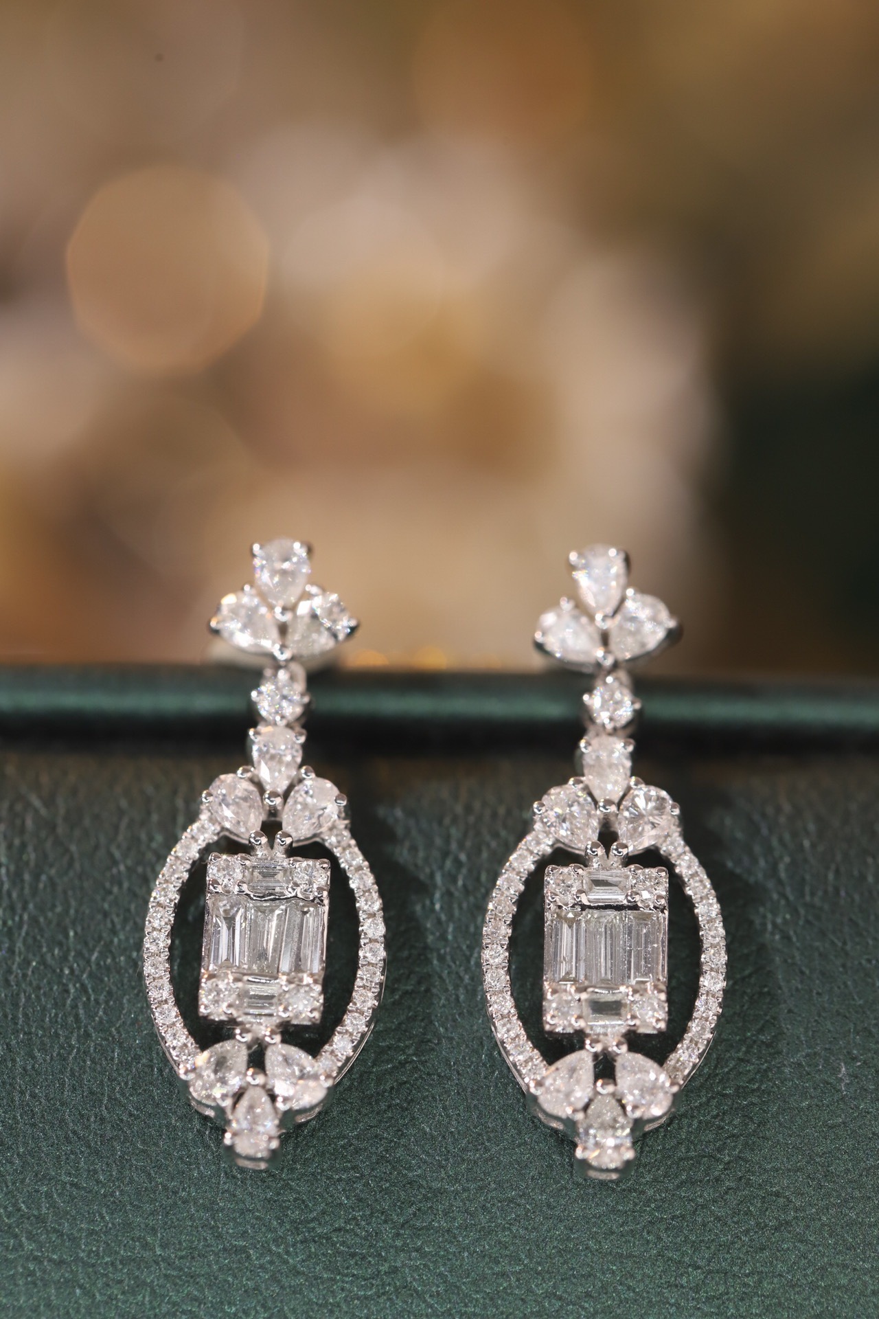 18k gold earrings set with a 1.00ct natural diamond