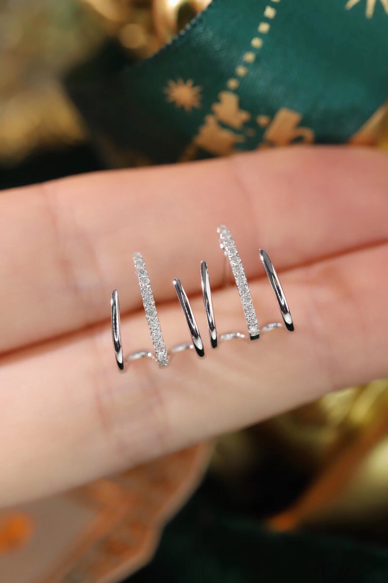 18k gold earrings set with a 0.12ct natural diamond