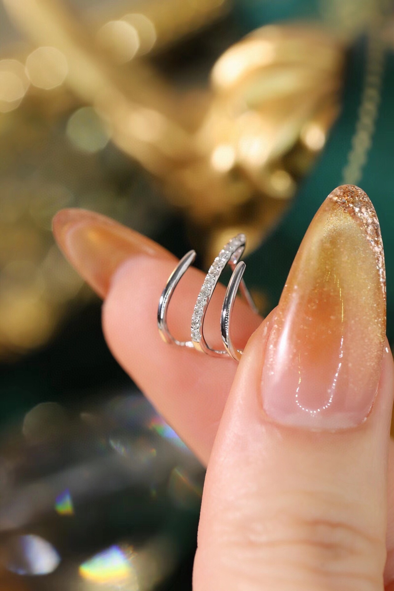 18k gold earrings set with a 0.12ct natural diamond