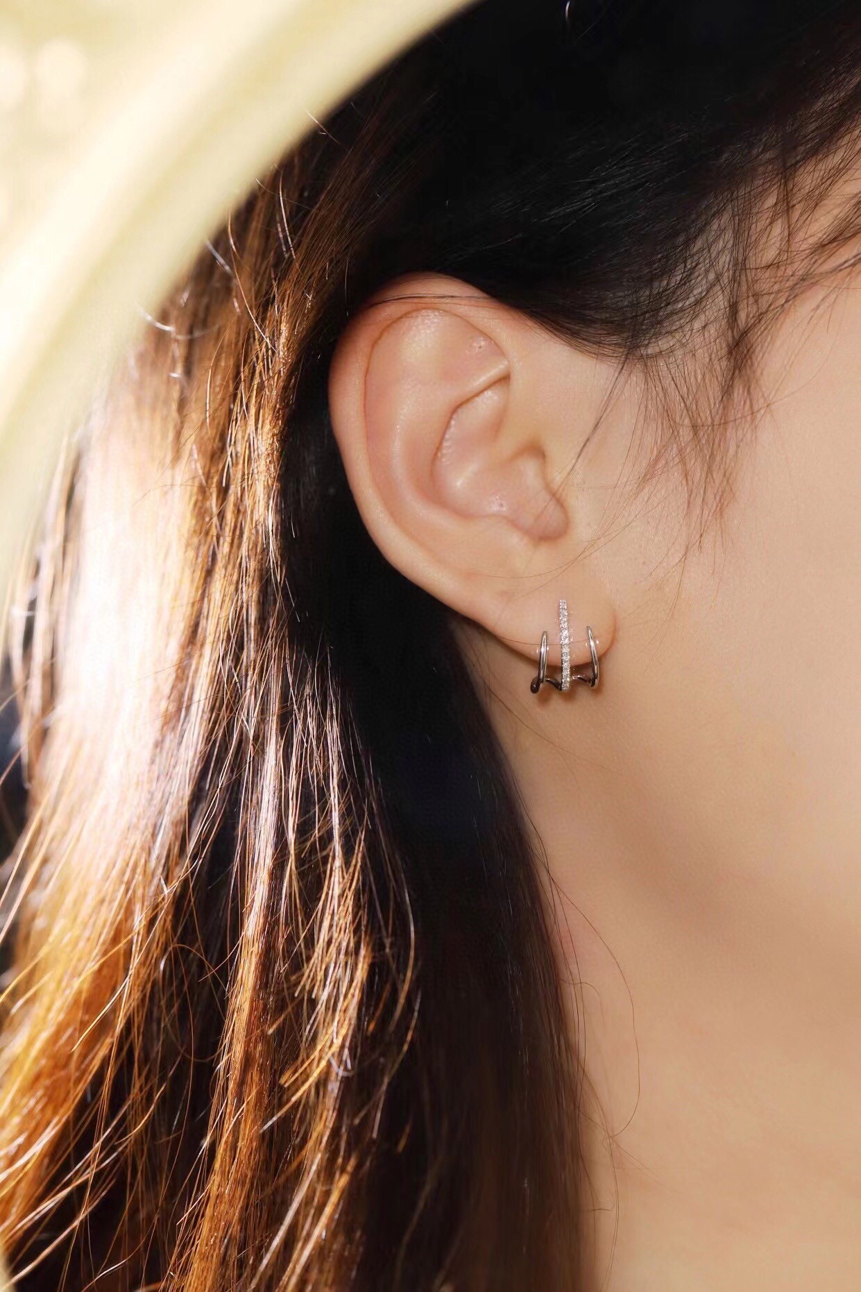 18k gold earrings set with a 0.12ct natural diamond