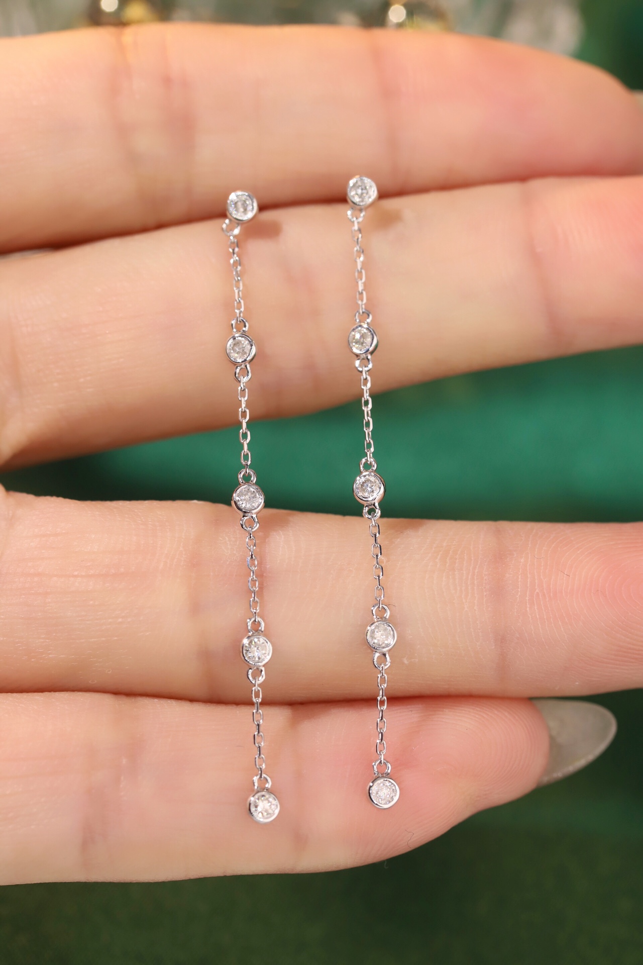 18k gold earrings with bezel setting, featuring a 0.30ct natural diamond.