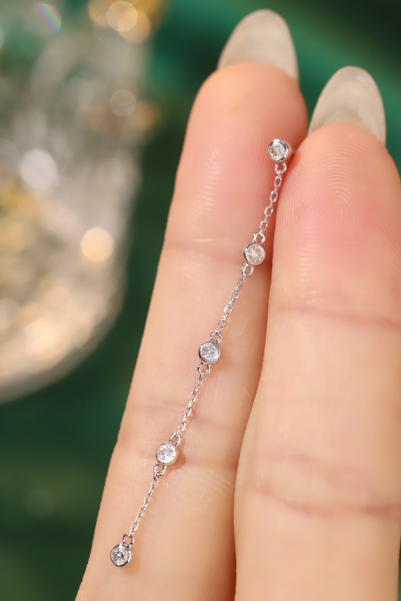 18k gold earrings with bezel setting, featuring a 0.30ct natural diamond.