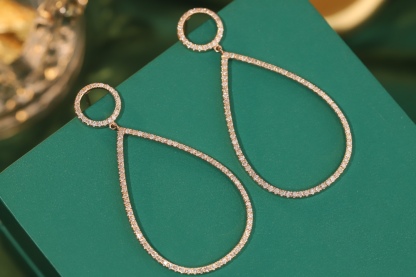 18k gold earrings set with a 1.20ct natural diamond